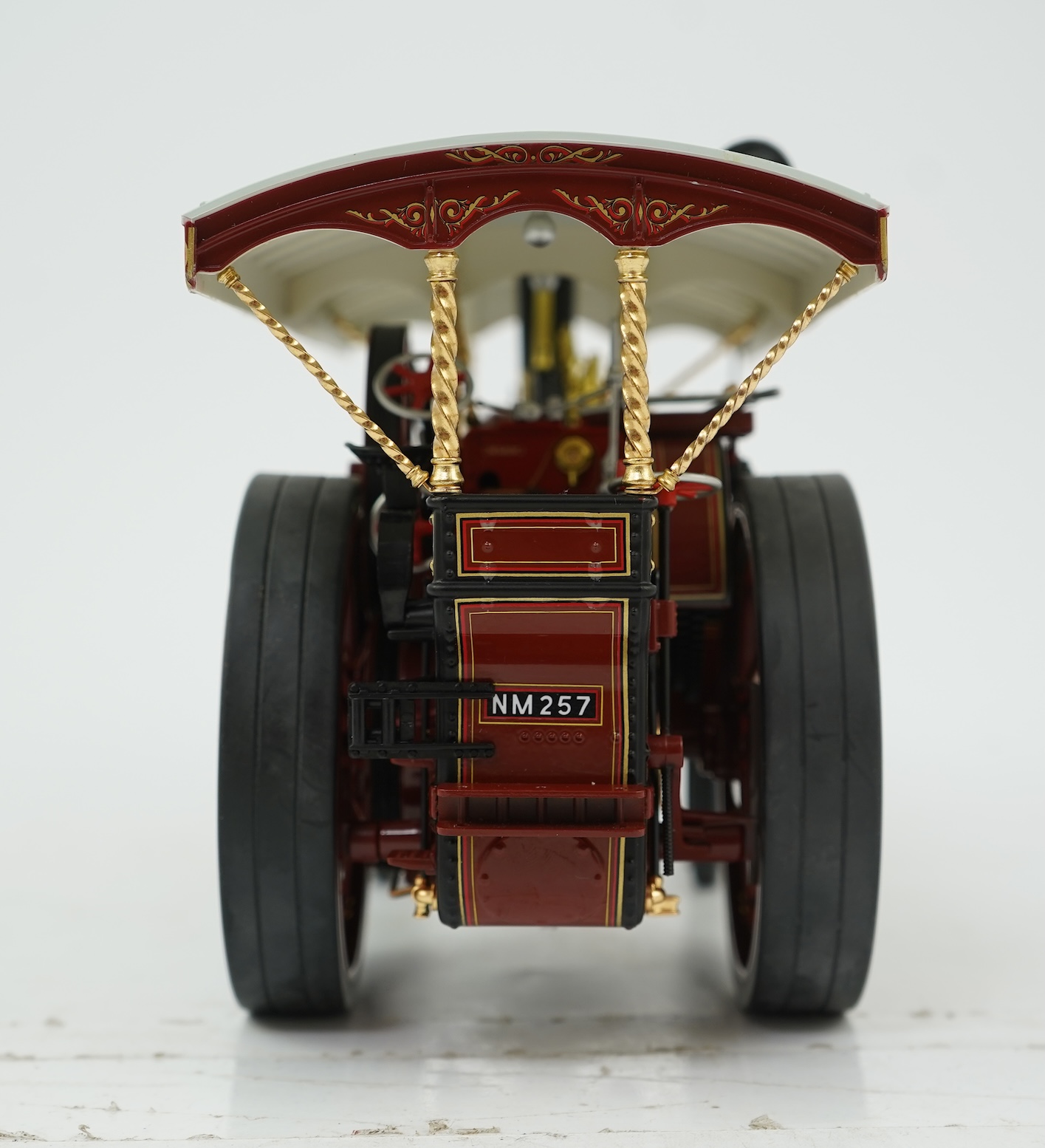 A Midsummer Models Ltd. 1:24 scale model of a Burrell Showman’s Engine, Britannia, in William Thurston and Son. Super Speed Cars livery, missing the original card box, but with an oak and Perspex display case
